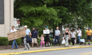 Residents Support Migrants with Clothing, March